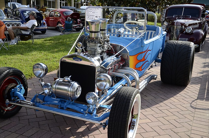 A 1923 Ford T-bucket, owned by Bill Garland of Palmetto, caught the eyes of passers-by with blue and flamed paint style.