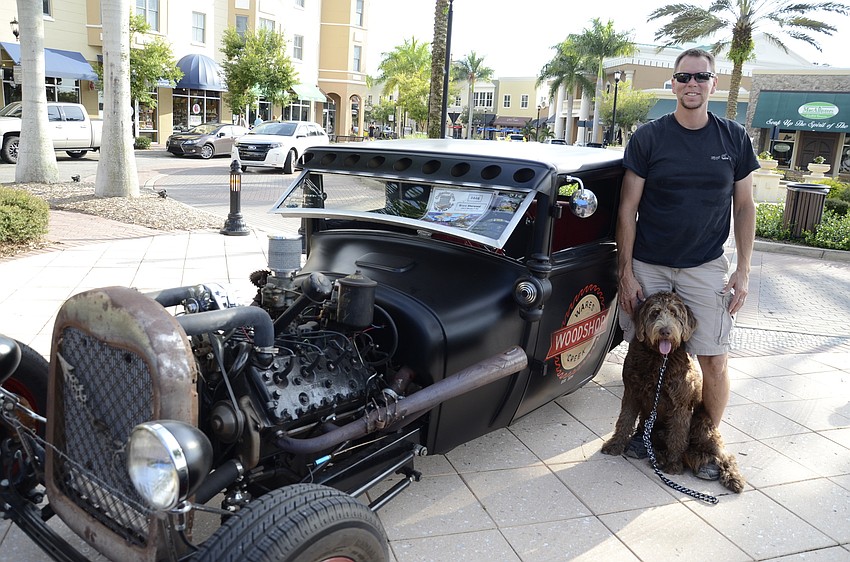 Bruce Sherwood and labradoodle Jackson brought this 1927 Ford Model T. On the side, Sherwood painted 