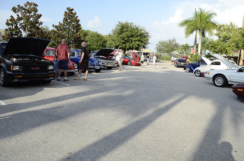 Car enthusiasts and Main Street visitors meandered around the classic car show.