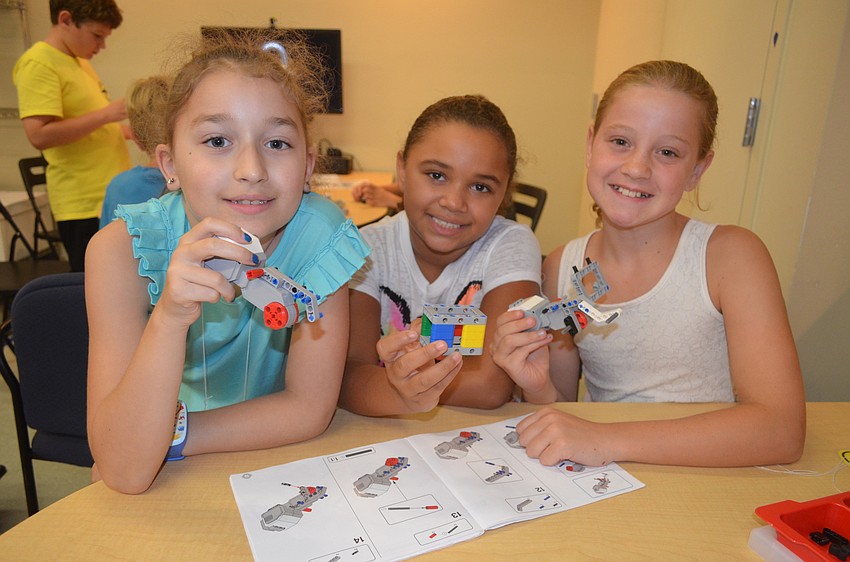 Angelina Levner, 9, Stephanie Green, 8, and Linnea Best, 10