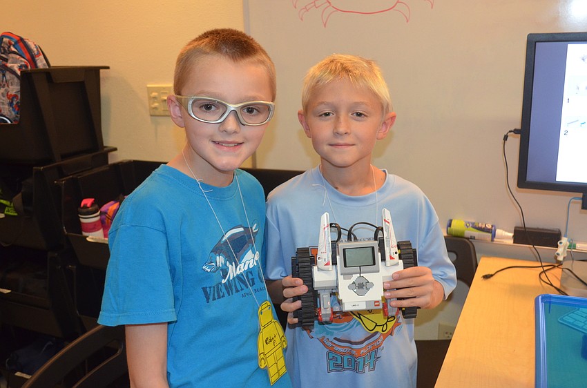 Robert Powers, 9, and Kai Byrd, 9