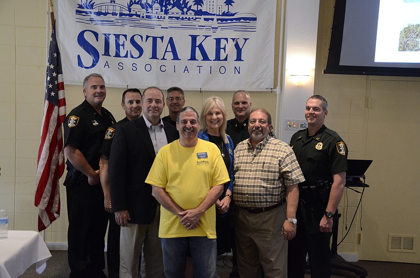 Tom Harmer, Catherine Luckner, Michael Shay and Alan Maio with the Sheriff's Office.