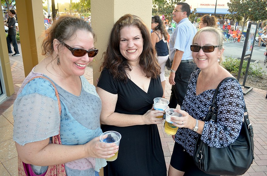 Gal pals Michelle Moss, Renee St. Aubin and Kathy Hazelhoff toast to a ladies' night out.