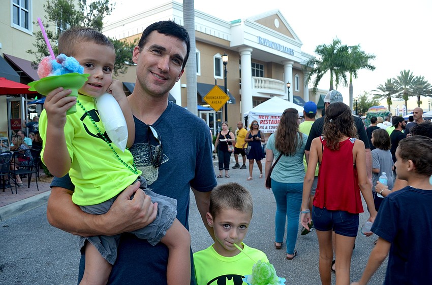 The Prater family — Brycen, Dave and Colton — enjoy sweet treats and cold eats.