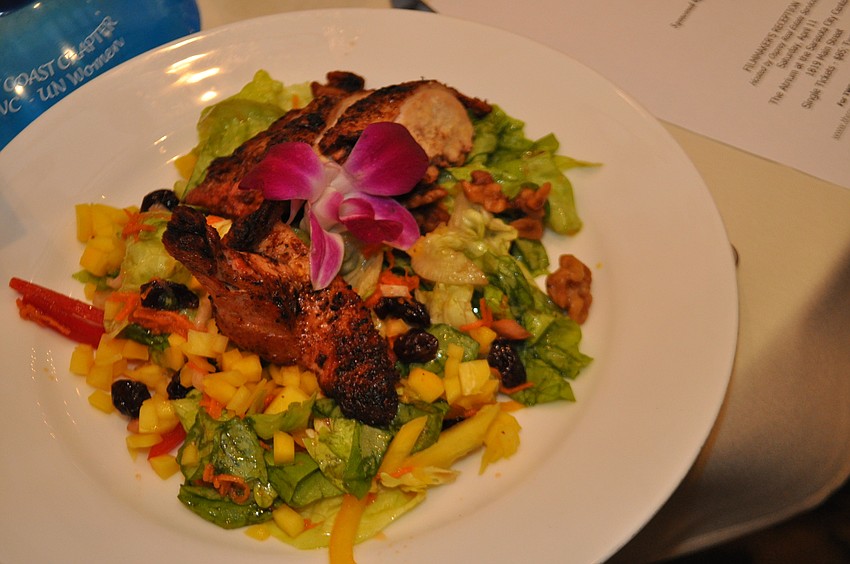uests enjoyed a salad topped with grilled chicken for lunch.