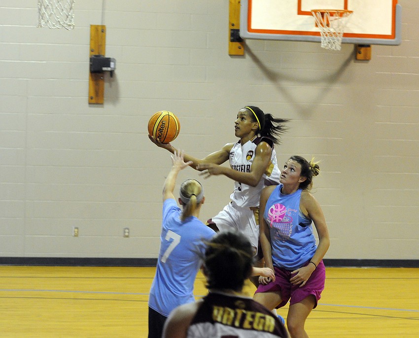 Venezuela’s Roselis Silva goes up for a layup in the first half versus the Sarasota Rec League Aug. 1.