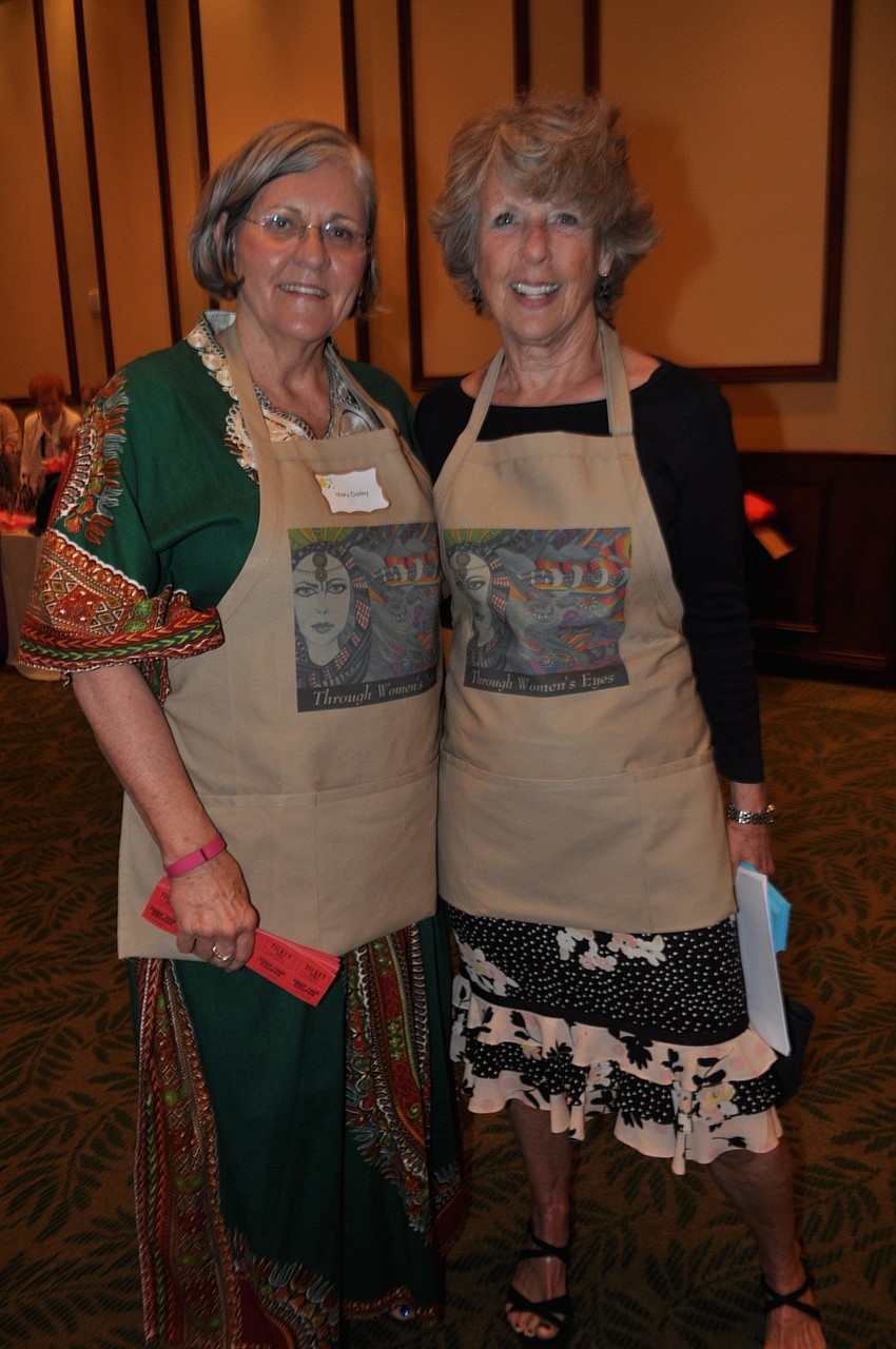 Mary Dailey and Terry Rixse sell tickets for the “Through Women’s Eyes” film festival, which is part of the Sarasota Film Festival.