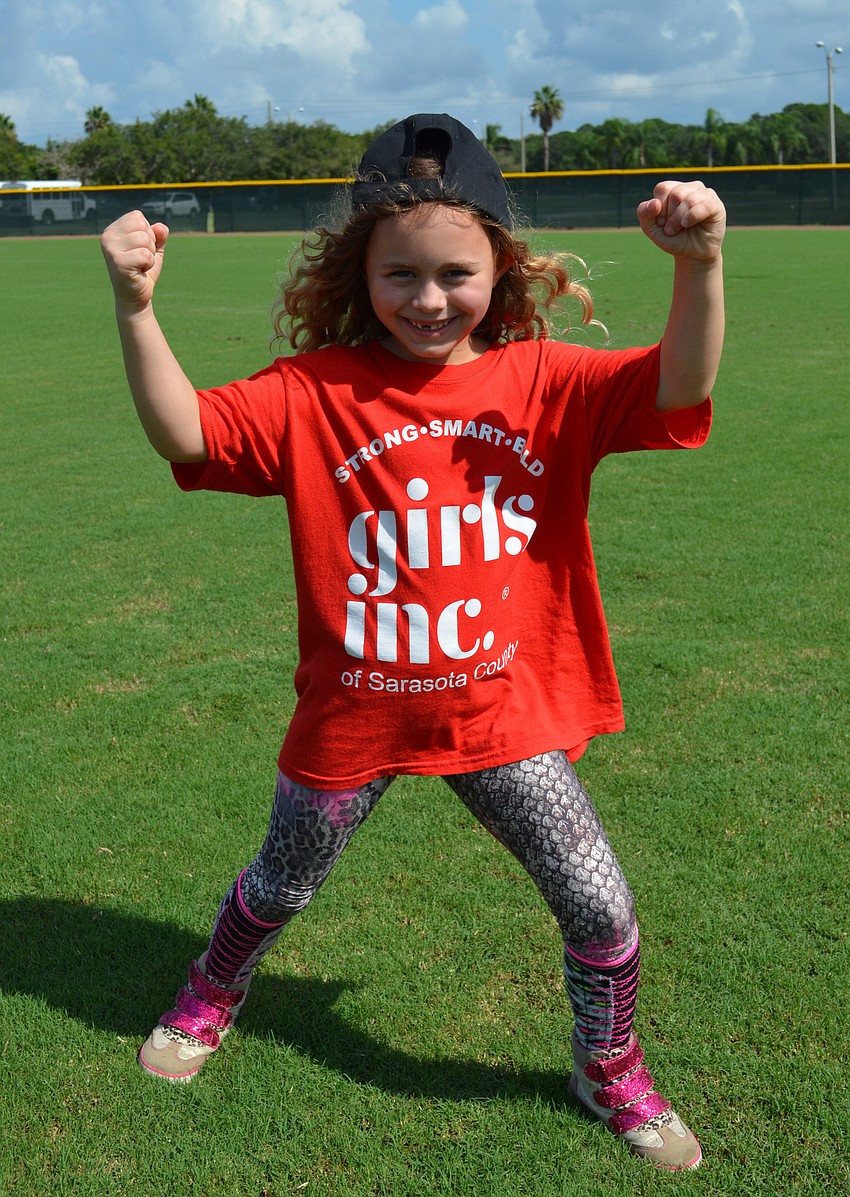 Bella Morrison shows off her baseball attire.