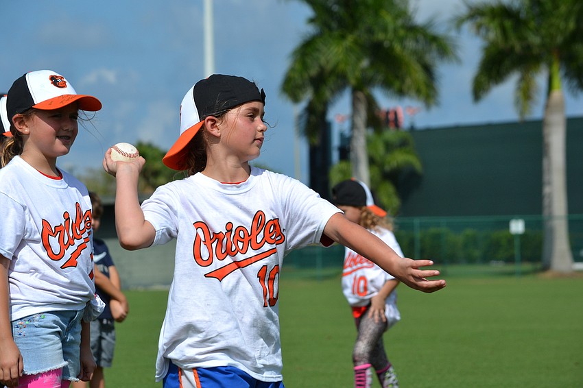 Molly Sullivan winds up to throw the ball.