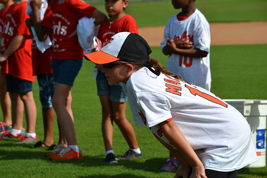 Riley Sullivan anticipates the ball during the Girls Inc. baseball clinic with the Baltimore Orioles.