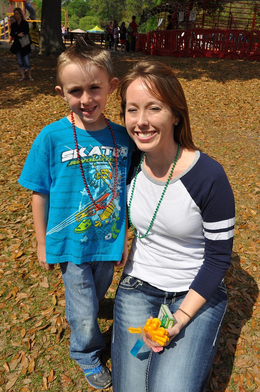 Ryan and Jamie Wingate make their way toward inflatable games.
