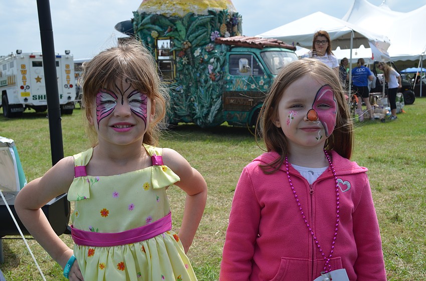 Brooklyn Peters and Allvia Watts show off their face paint.