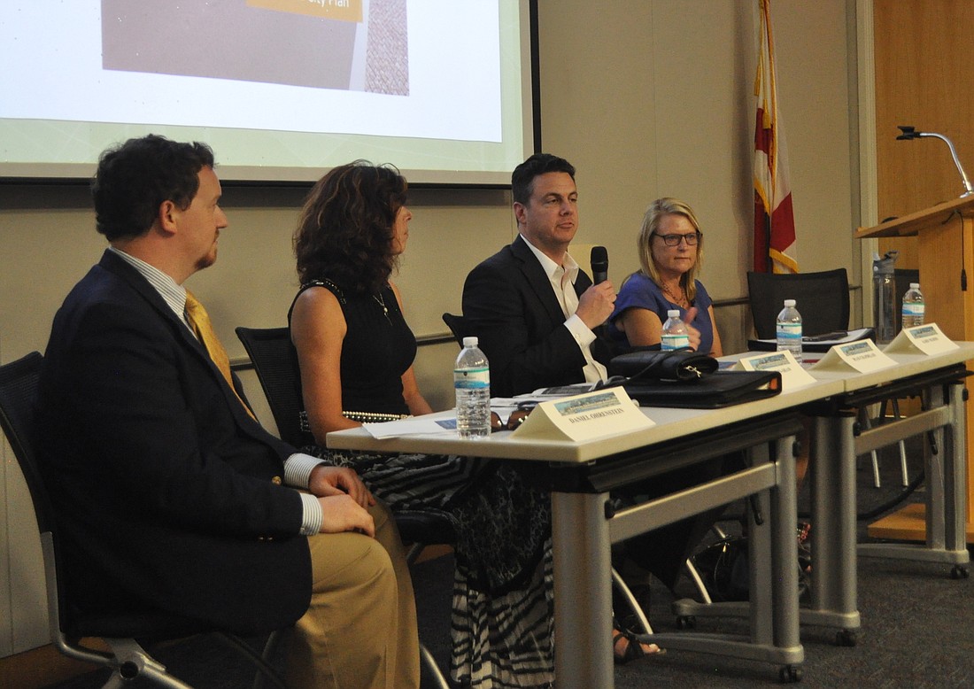 City employees Daniel Ohrenstein, Alex DavisShaw, Ryan Chapdelain and Karin Murphy led the panel discussion on traffic Monday evening.