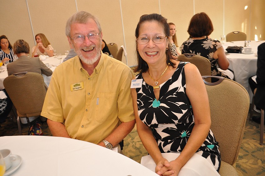 Ed Nugent, of Cornerstone Signs and Graphics, sits by Maria Hussey, of JDRF.