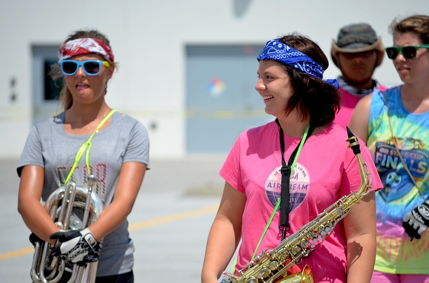 Alexis Sicard shares laughs with a friend between sets.