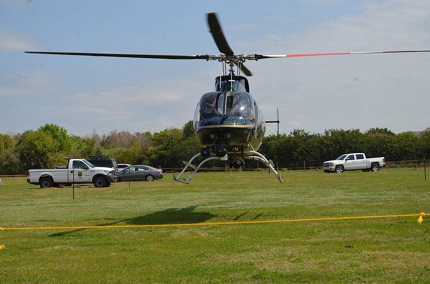 A Sarasota County Sheriff’s Office helicopter lands at Springfest.