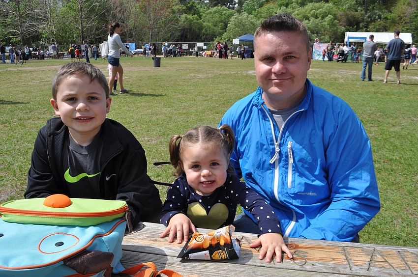 Aiden, Alivia and Brandon Patterson settle down for lunch.