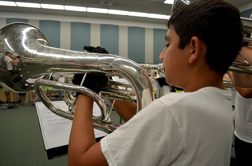 Vincent Gulbrandsen plays mellophone with the rest of his section.