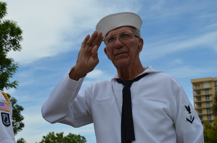 Bill Lonnroth holds his salute during the Star Spangled Banner.