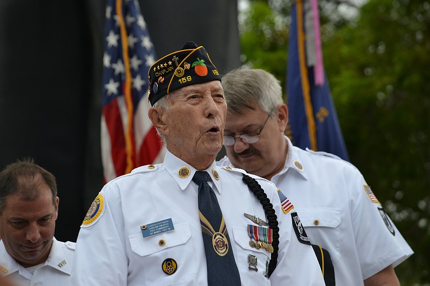 American Legion Post #129 Chaplain Emeritus Loren Pittman addresses guests during the VJ Day ceremony.