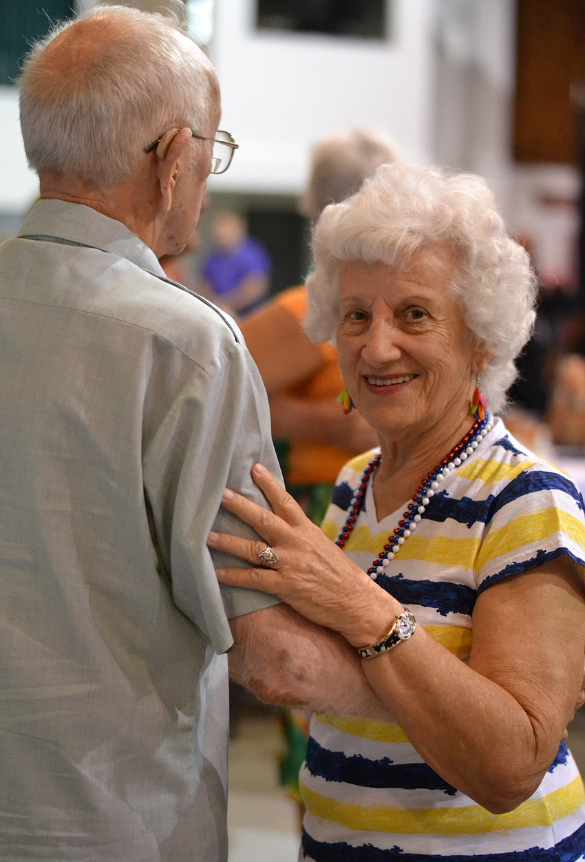 Beverly Haraldsen and Earl Hampsher take a turn on the dance floor.