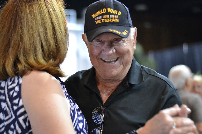 Chuck Gross dances with his niece Dona Stewart.