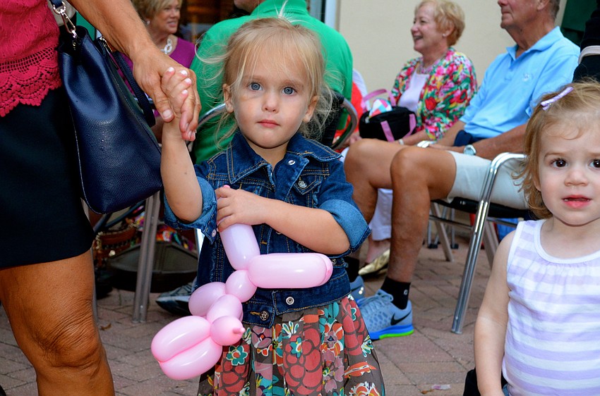 Livia Peterson loves balloon-made animals.