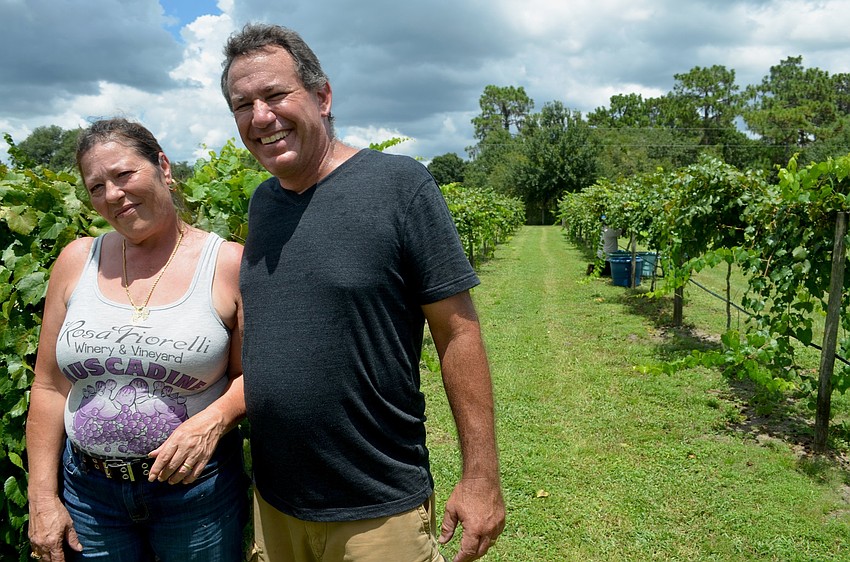 Rosa Fiorelli poses with new winery owner Dave Chaloupka.