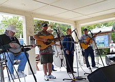 Flo Harms sings during the picnic.