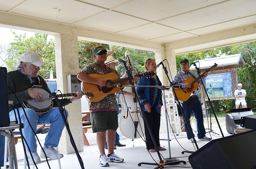 Flo Harms sings during the picnic.