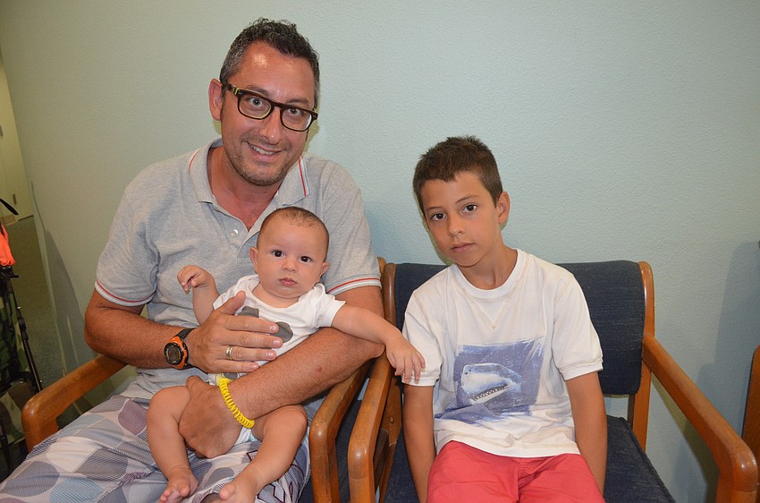 Alberto, Alessandro, 9 months, and Filippo Francioni, 7