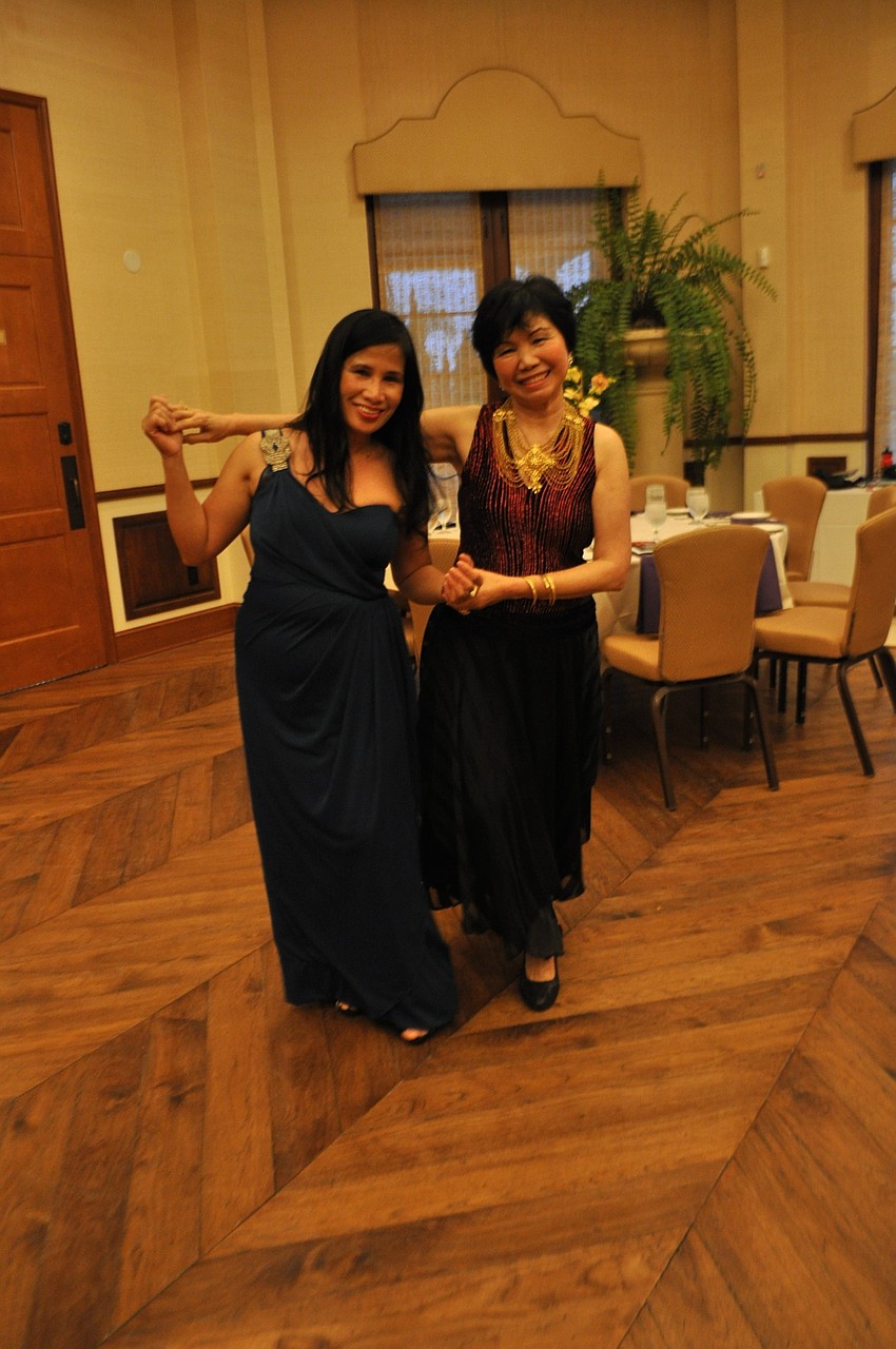 Virgie Lynch and Nida Seay dance before dinner.