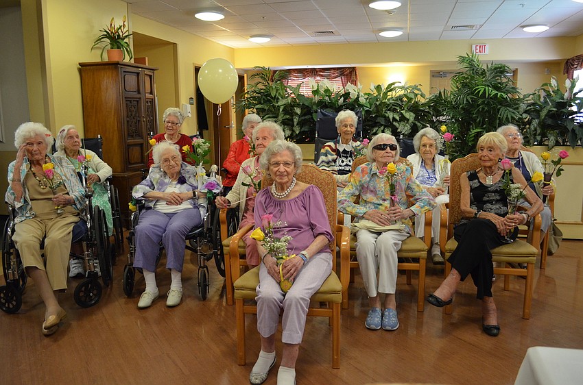 A group of 12 residents at Pines of Sarasota collectively celebrated their 100th or more birthdays with a tea party Friday, August 14.