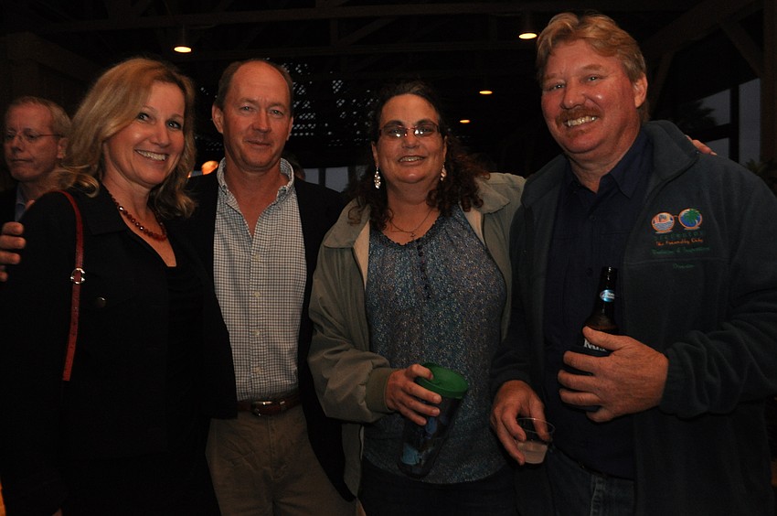 Sandra Wix, James Clarke and Shari and Jeff Mitchell