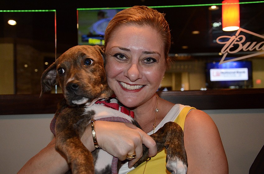 Jessica Ortiz, the co-chair of Nate's Honor Ponies for Pups, brought her pup, JJ, to the event. Ortiz adopted JJ from the rescue 6 weeks ago.