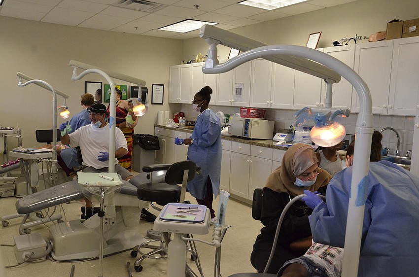 Dr. Eftekhar Arshadi and Dr. Fotois Skordas volunteered to do dental work at Smiles and Styles.