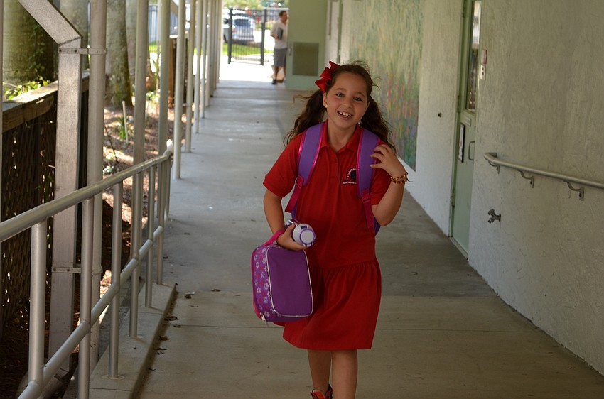 Sascha Galkoff walks down the halls of Southside Elementary School.