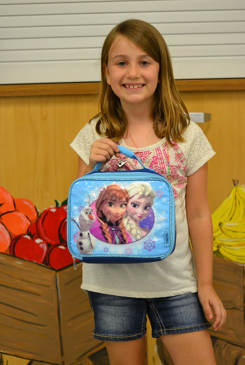 Sara Pruett shows off her Frozen lunchbox.