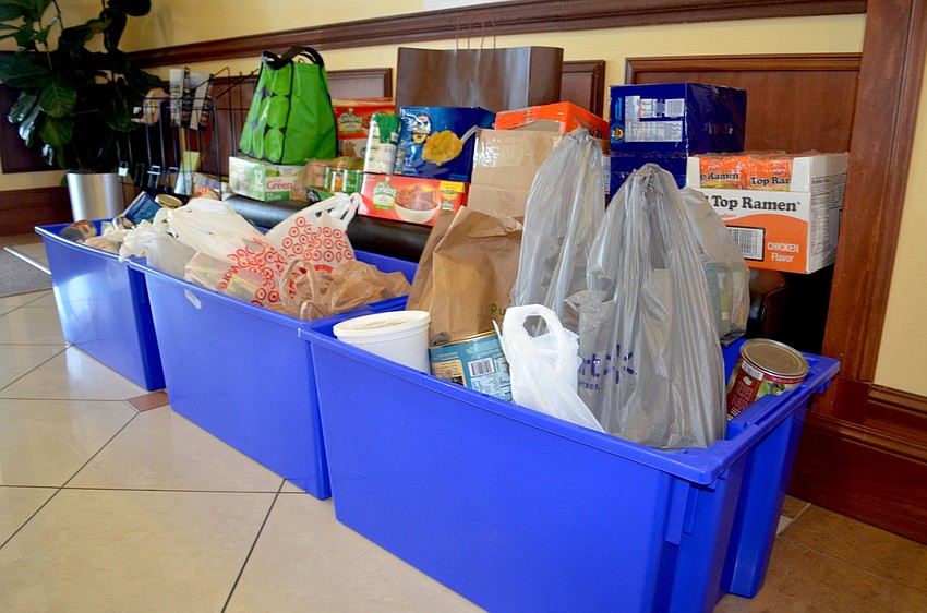 In lieu of payment to operate a booth at the fair, the college collected nonperishable items to later donate to local food banks.