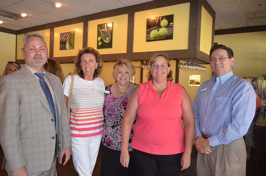 Jeff Merckle, Wendy Collins, Debbie Beheler, Cathy McFatrick and Jesse Cook, of event sponsors RVA