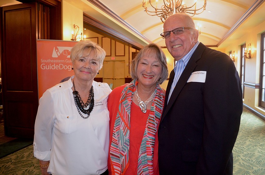 Christa Friedlander, Kay Karioth and Len Friedlander helped raise money at a local walkathon to name a Southeastern Guide Dog, Treasure.