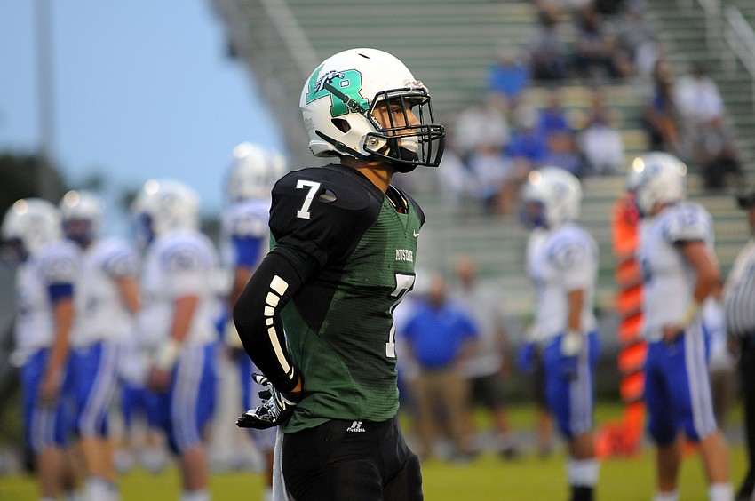 Senior wide receiver Trevor Losada looks to the sideline for the play call in the first half.