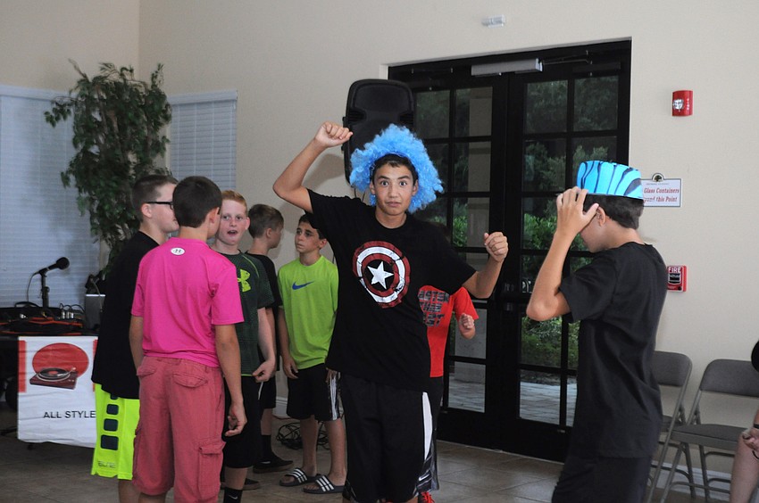 Jace Chapman, 12, shows off his new hair.