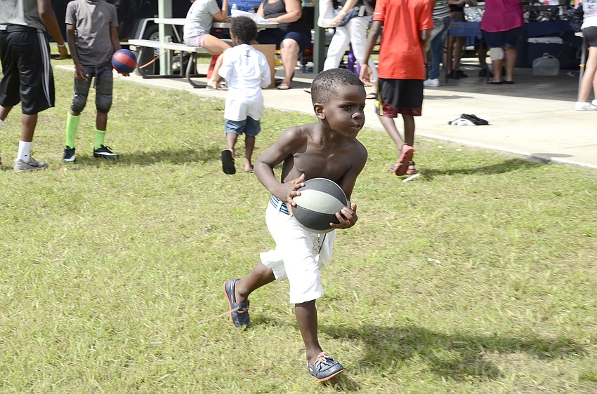Jotvarte Anton, 6, practices a layup.