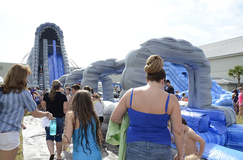 The monster slide gathered a long line of eager dare-devils.