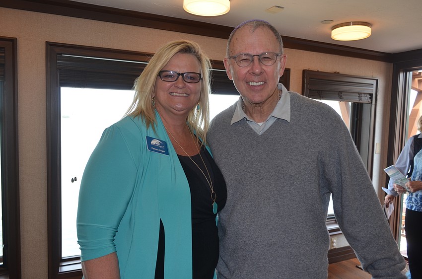 Tour guide Pamela Hagan and home owner Bill Libman
