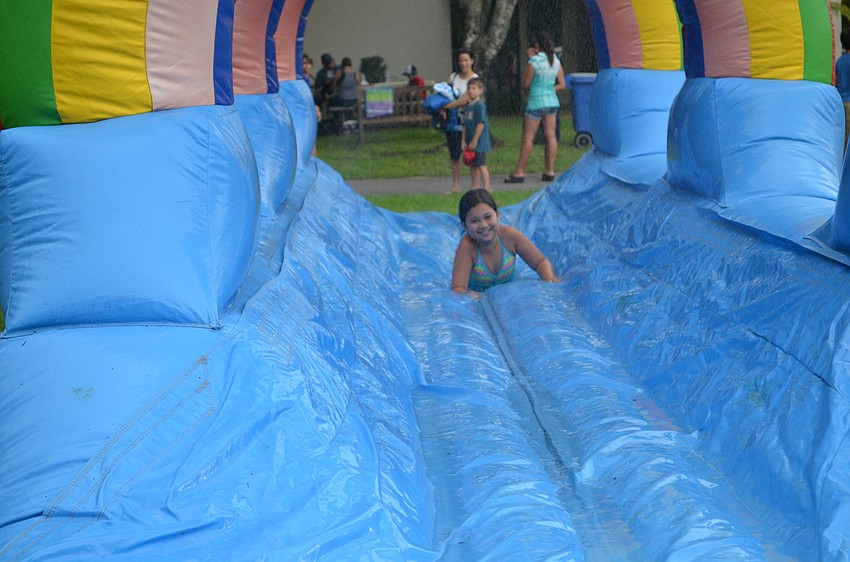 Naomi Yamada takes a turn down the water slide.