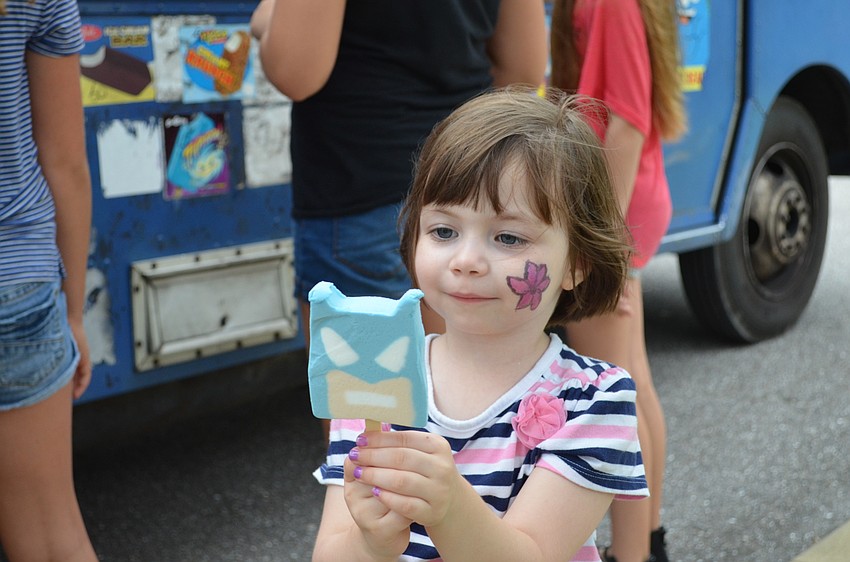Norah Ceaser admires her Batman ice cream.