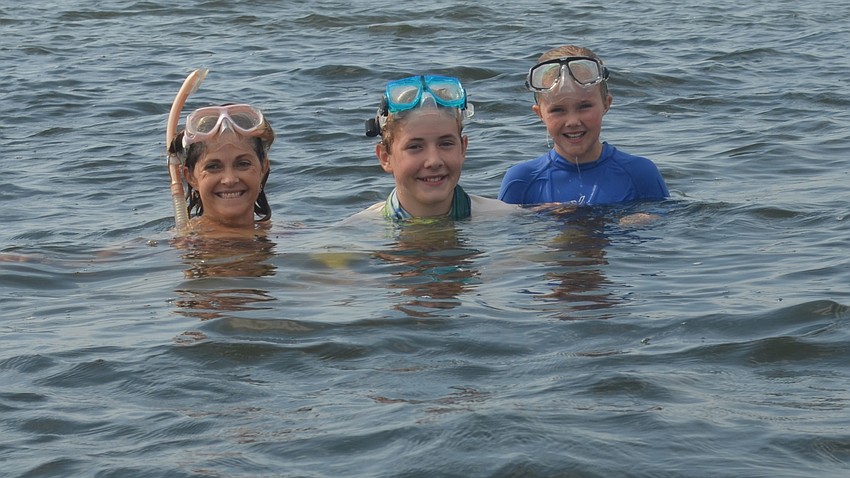 Krista Toomre with Thomas, 11, and Camille Johnson, 12