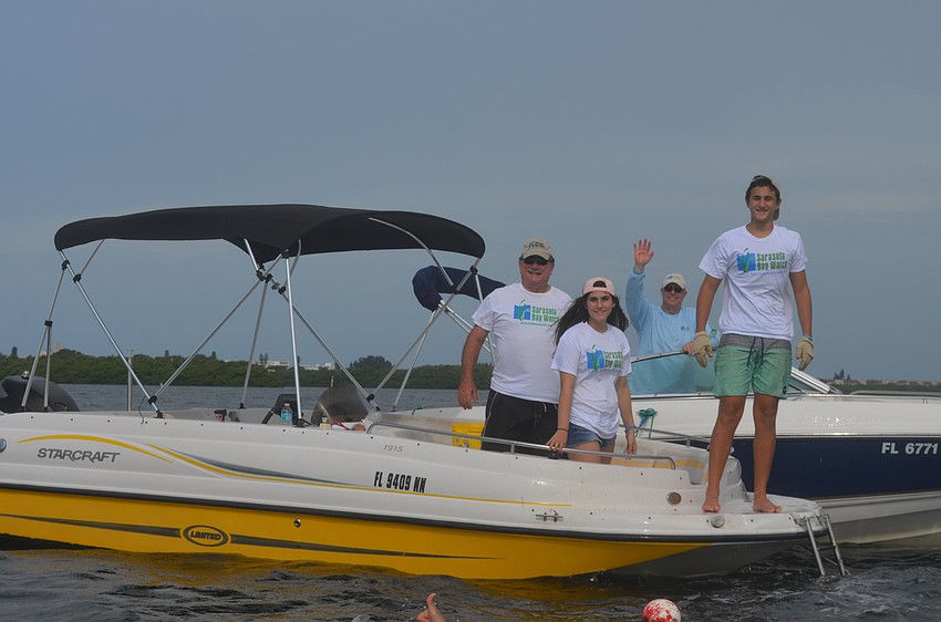 Steve and Ellie Martin, Sarasota Bay Watch Chairman Larry Stults and Jack Martin
